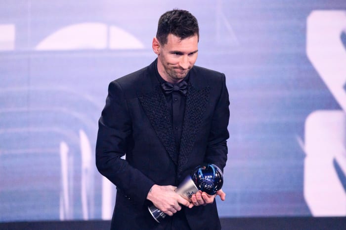 Lionel Messi pictured holding his trophy after winning The Best FIFA Men's Player award for 2022